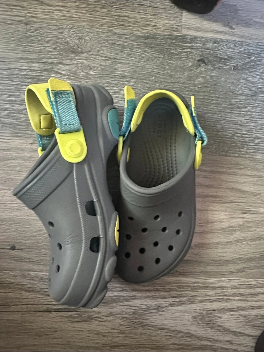 CROCS all terrain Clogs in Gray with Yellow Heel Strap kids size J1